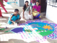 SY.BMS students while Rangoli on : SAVE NATURE theme